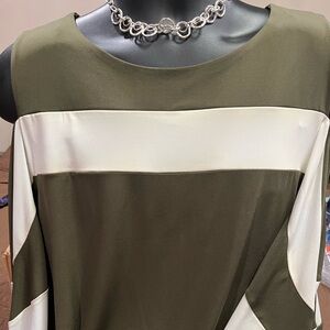 Women’s dress  Nina Leonard ;never worn ;shoulders out and has a mid way sleeve